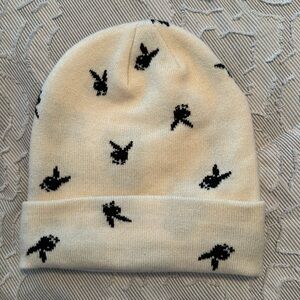 Playboy cream colored beanie with black bunny logo.